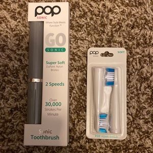 Pop sonic toothbrush with replacement heads